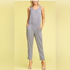 Doublj heather gray sleeveless jumpsuit with pockets. Size medium.  Never worn.